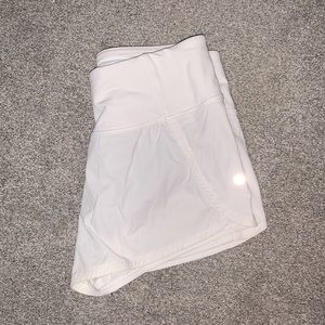 white lululemon speed up shorts in 0; USED ONCE!!! no spots VERY GOOD SHAPE!!